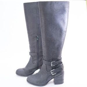 Black leather knee high boots with buckles